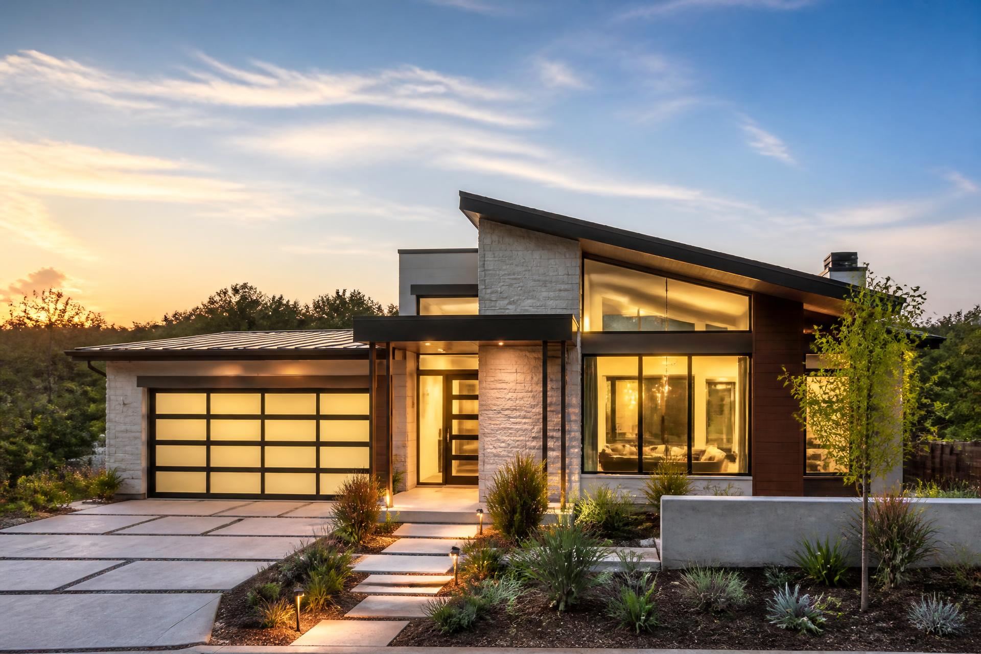 Modern, energy-efficient home at golden hour with clean lines and warm lighting